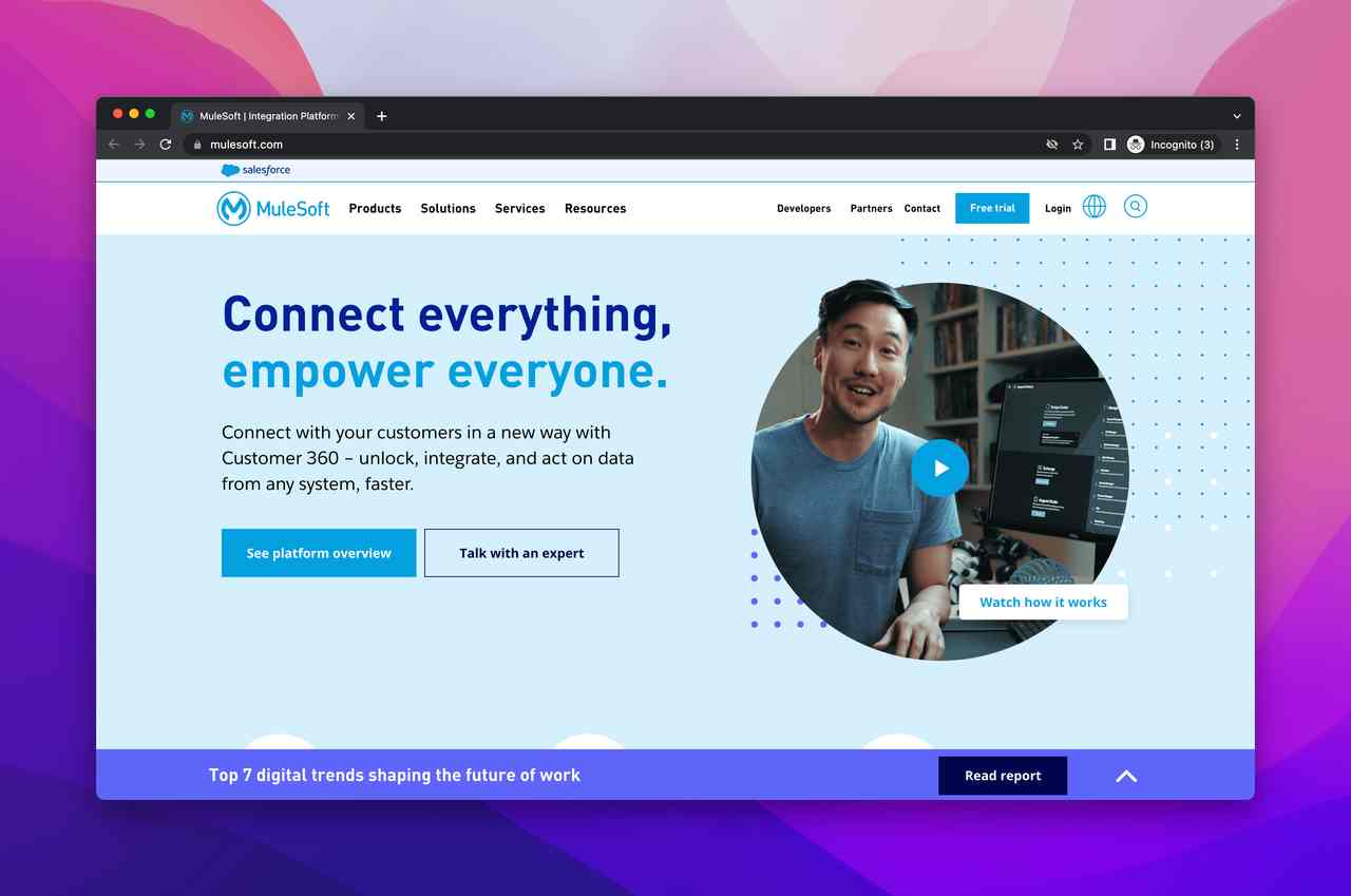 Mulesoft website screenshot showing an asian man and a blue background representing the brand as one of the best integration software tool