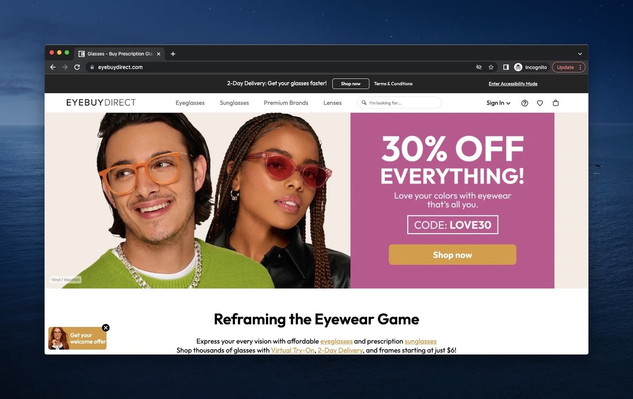 EyeBuyDirect above the fold example with a couple wearing glasses and a discount offer