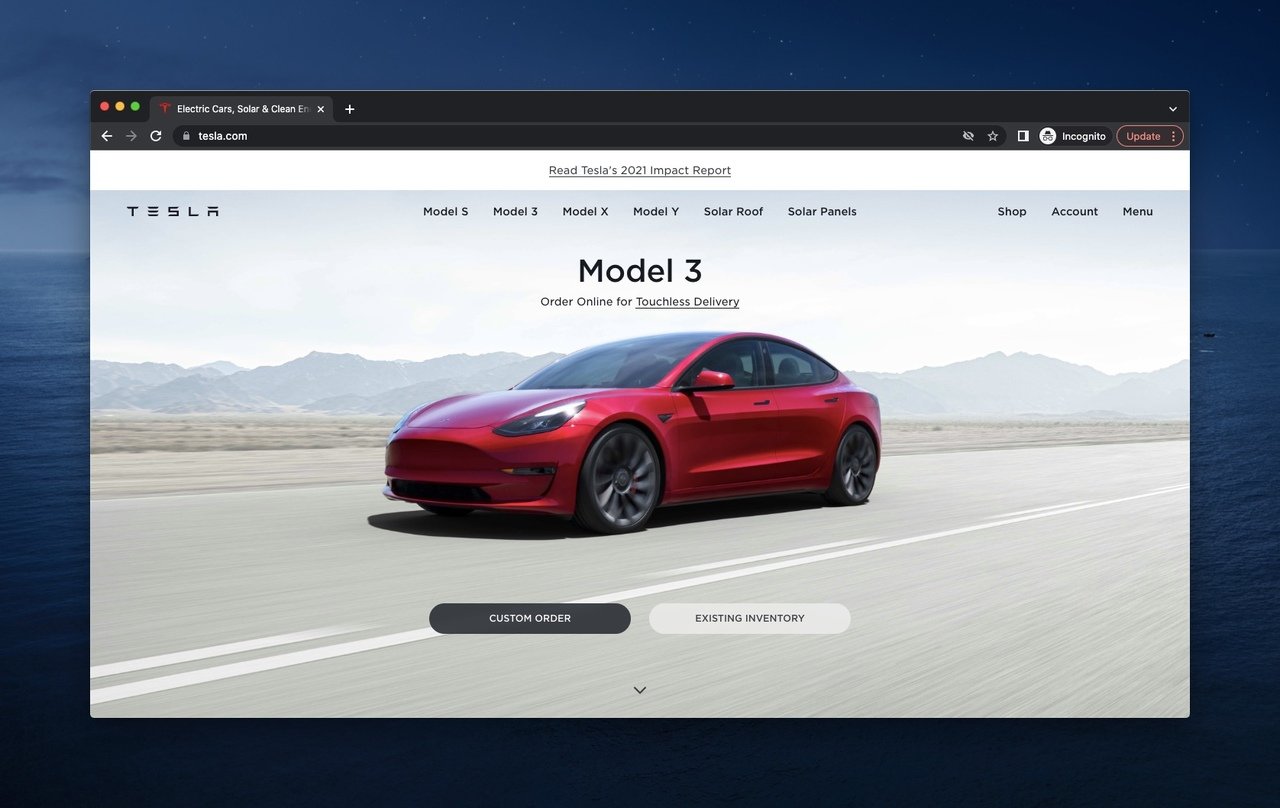 Tesla above the fold example showing a Model 3 driving on the road