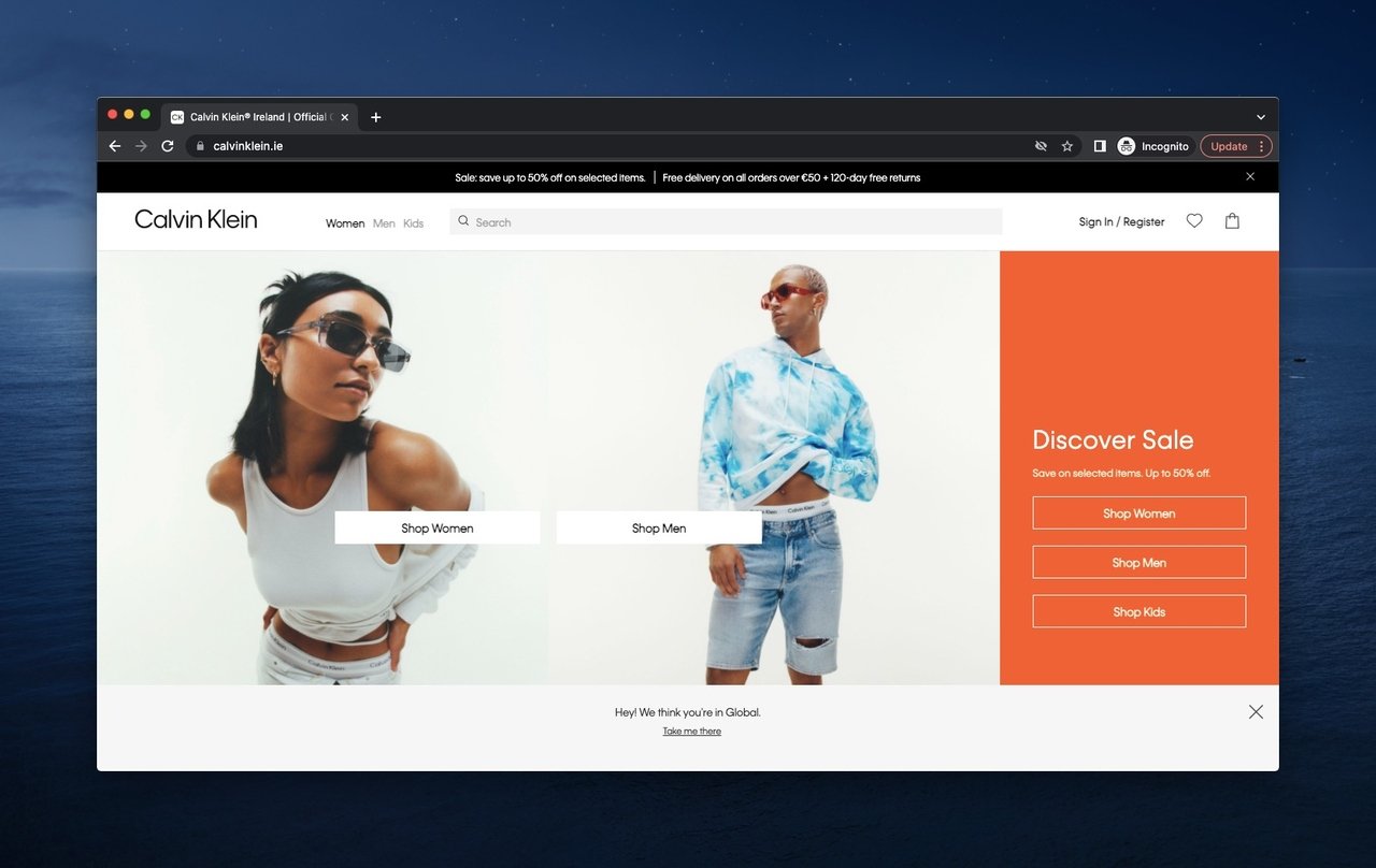 Calvin Klein above the fold example with two figures wearing CK products on an orange background