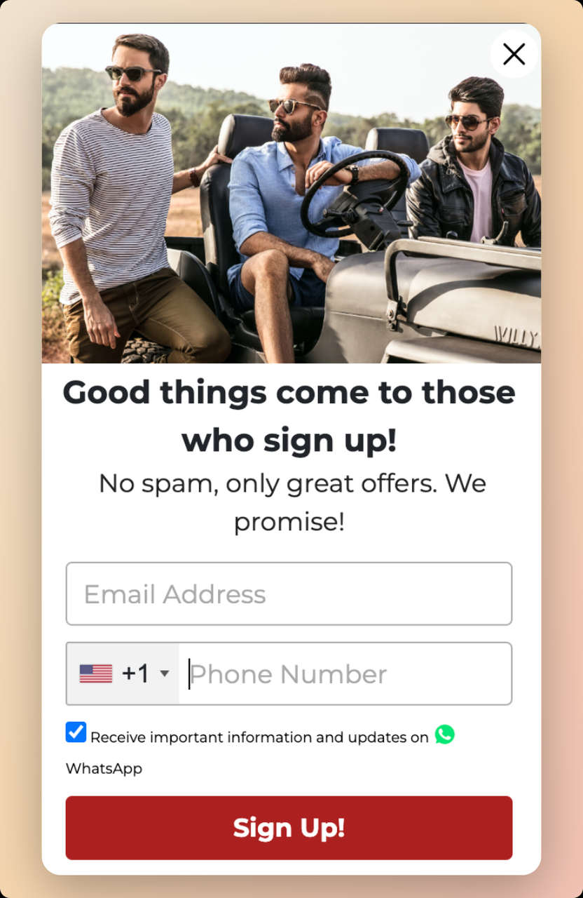 The man company SMS popup example with a picture of 3 men with a car looking to the left side wearing eye glasses on top and a bold text that says Good things come to those who sign up