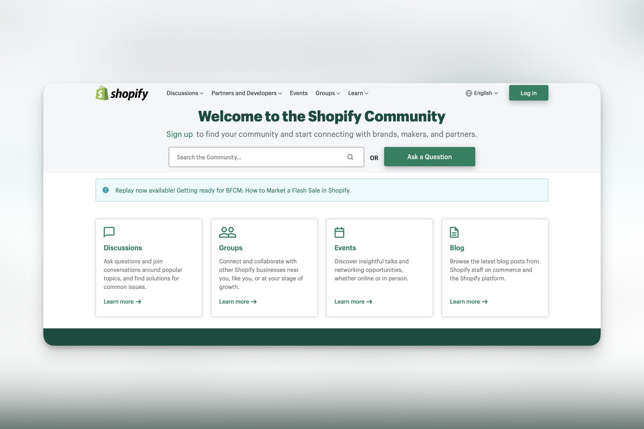 Shopify Community page with discussions groups events and blog sections for merchant engagement