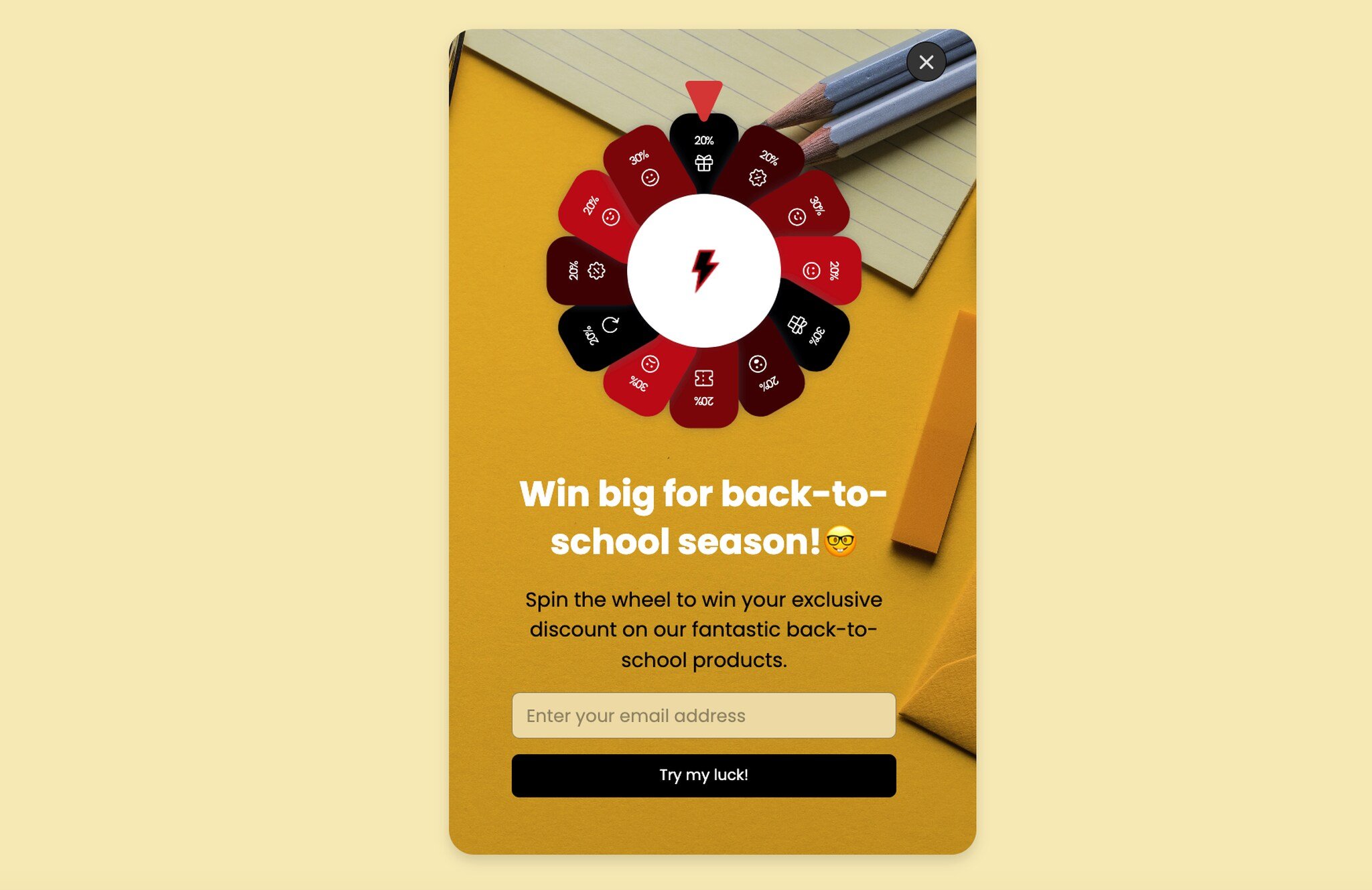 Spin-the-wheel back-to-school popup with the headline 'Win big for back-to-school season' and a colorful prize wheel