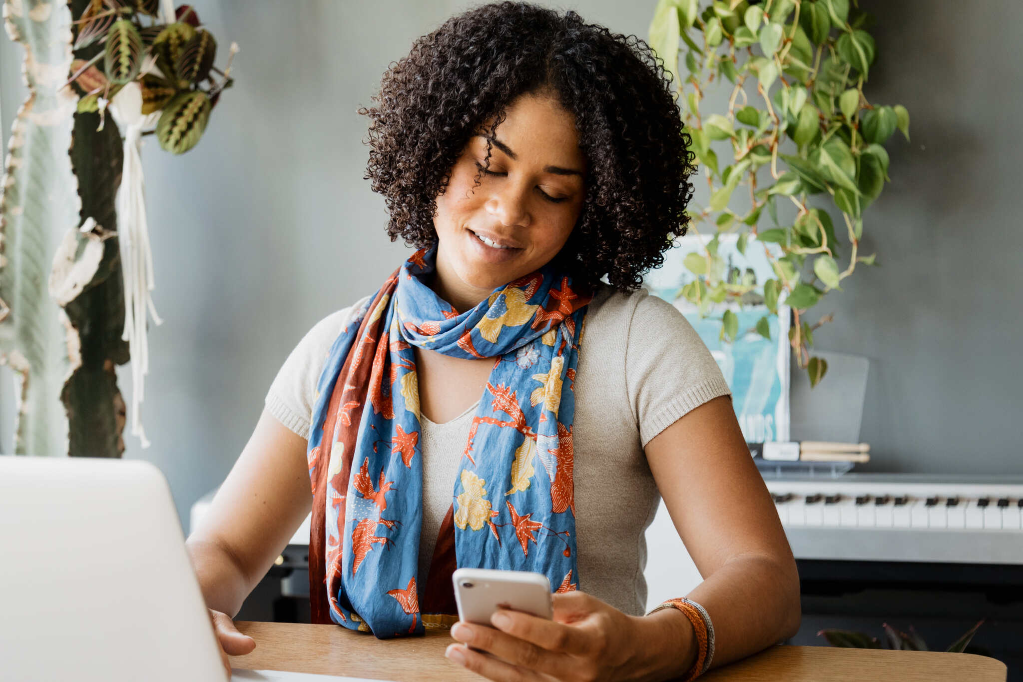 key benefits of mobile marketing shown as a young woman engages with content on her phone