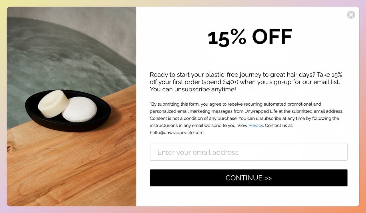 Unwrapped Life cart abandonment popup offering 15% off in exchange for the visitor's email address