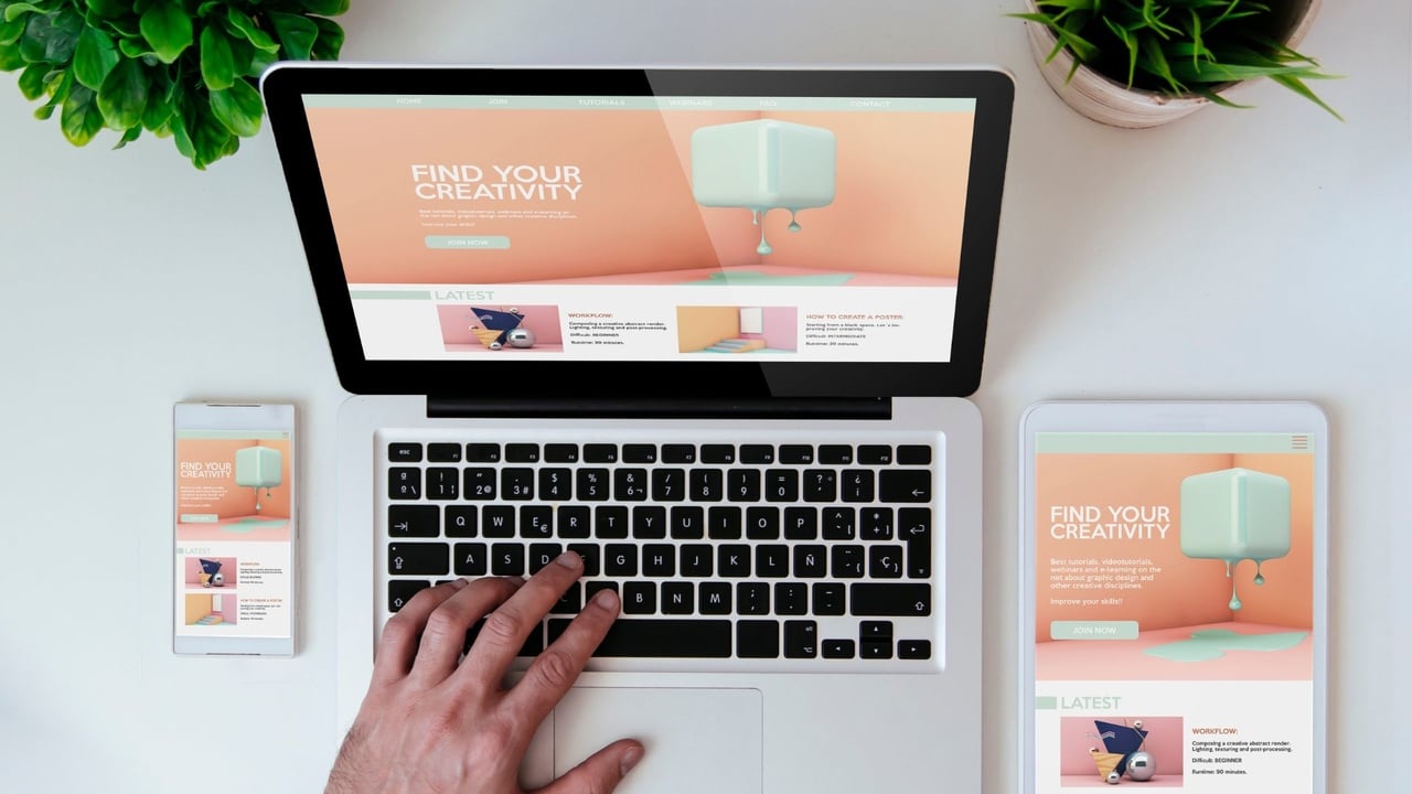 Website shown across phone, laptop, and tablet as responsive hub