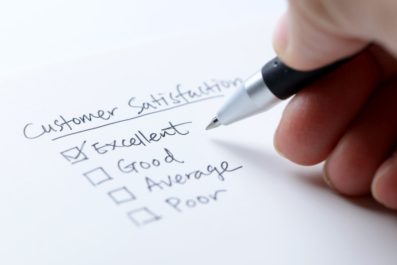 Person filling out mobile survey feedback form to help improve website user experience
