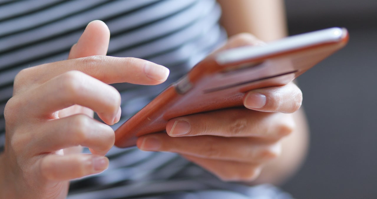 woman using smart phone