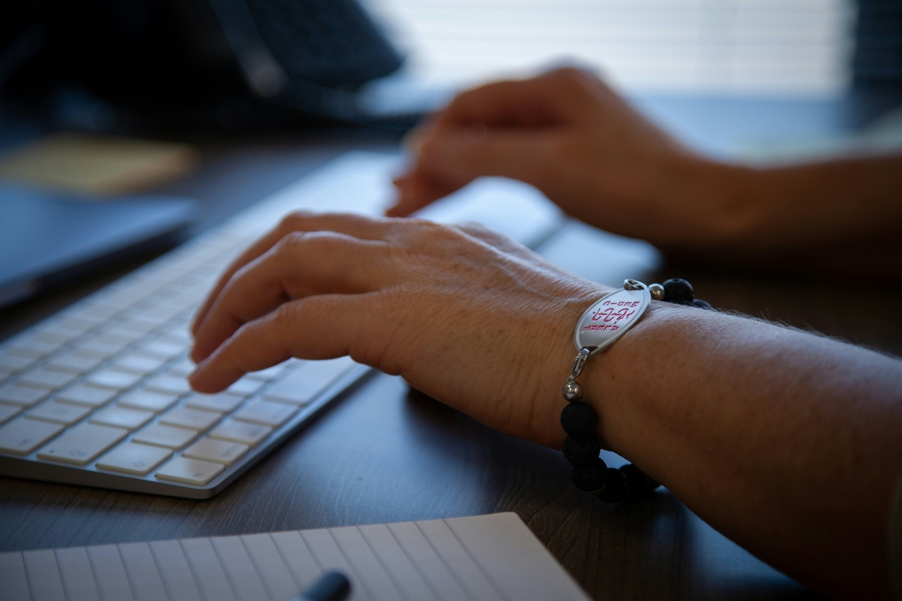 marketer reviewing email open rate and click-through metrics on a dashboard