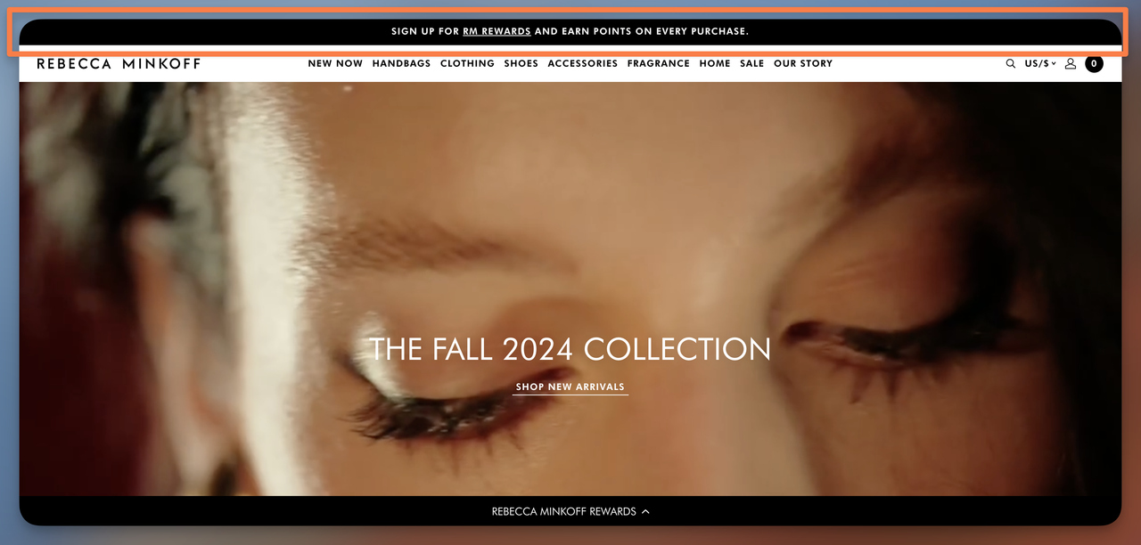 Rebecca Minkoff announcement bar promoting RM Rewards loyalty program sign-up to earn points