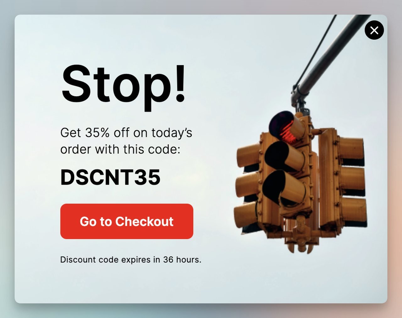 Cart abandonment popup offering 35 percent discount with a red Go to Checkout CTA button and traffic light imagery