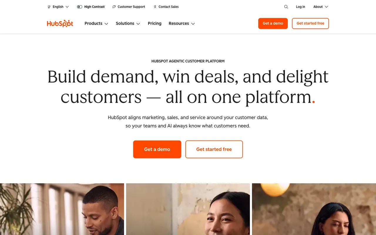 HubSpot homepage first screen: serif headline about building demand and winning deals on one platform, with Get a demo and Get started free buttons